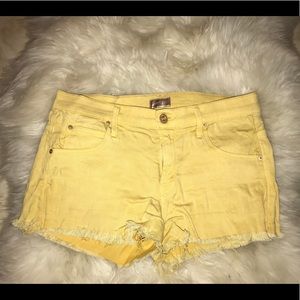 Mother yellow cutoff shorts. Size 25.